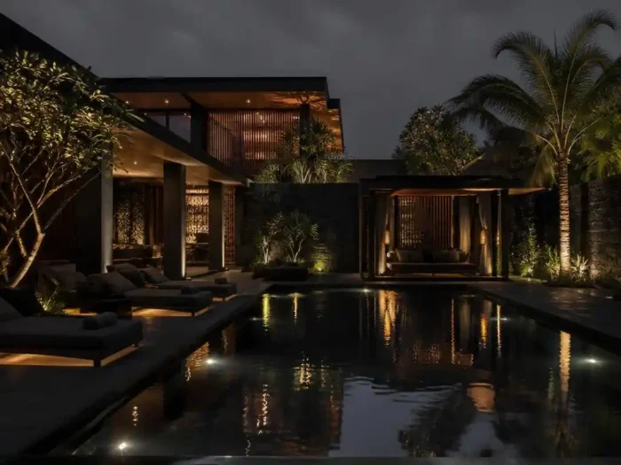 Progettare una moderna residenza con piscina dal design oscuro